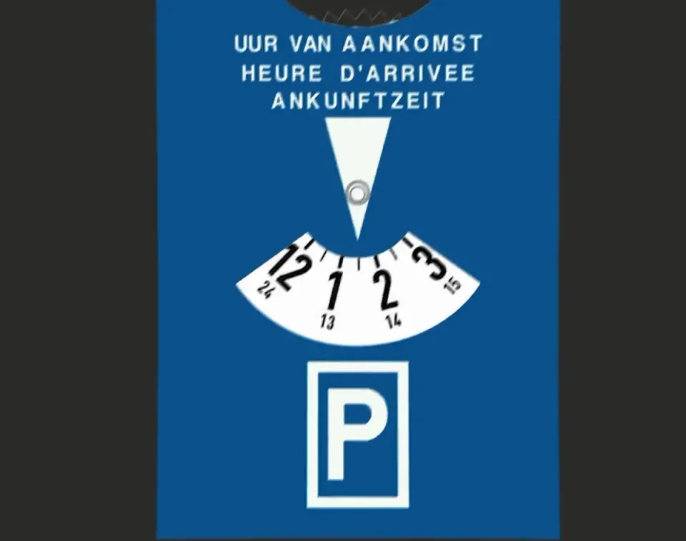 Blue parking disc showing 'time of arrival', set to half past one