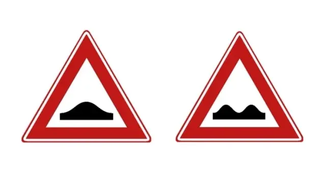 Left sign J38 speed bump, right sign J1 poor road surface