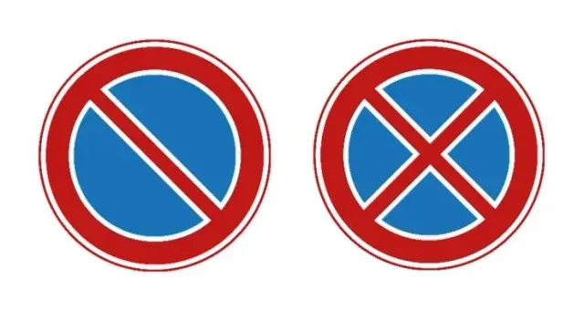 Bord E1 parkeerverbod en bord E2 stilstaanverbod naast elkaar