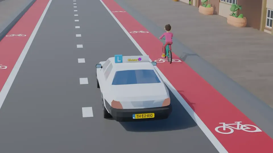Learner car passes a cyclist on a red cycle lane without touching the line