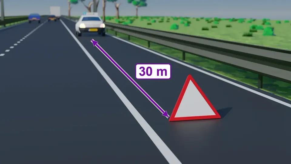 Place the warning triangle about 30 metres behind the car, clearly visible to approaching traffic.