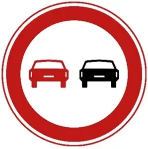 Sign F1 is a separate ban. Even if the line is broken, you may not overtake a motor vehicle here.