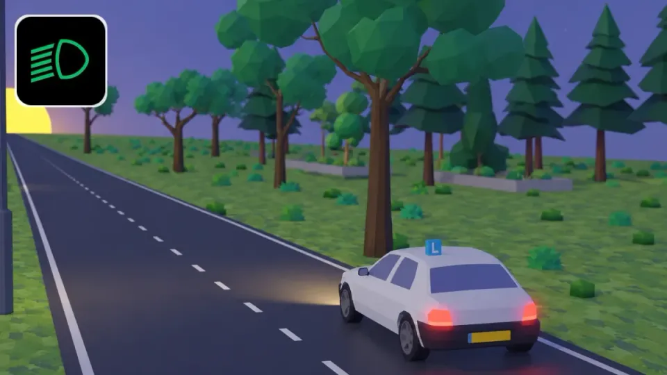 A learner car drives at dusk with dipped beam on. The red rear lights are on too. Top left you see the dipped beam symbol: a green lamp with slanting lines.