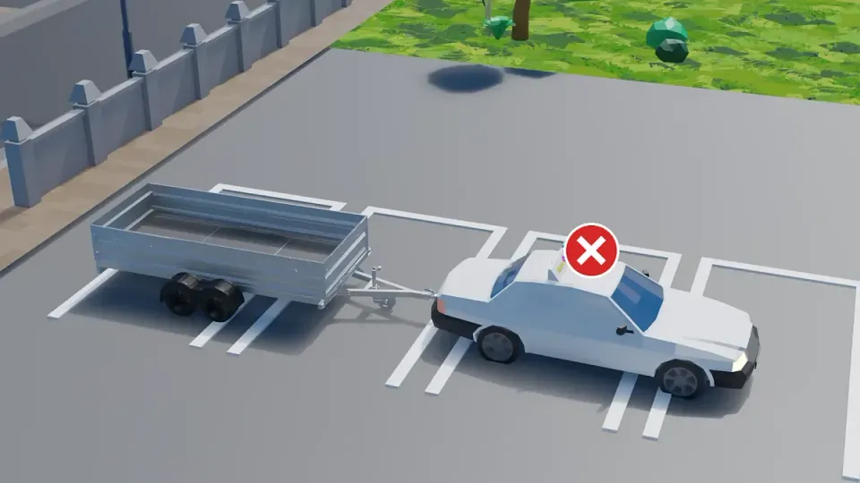Wrong: car and trailer standing across several parking spaces. Always park inside the lines of one space.