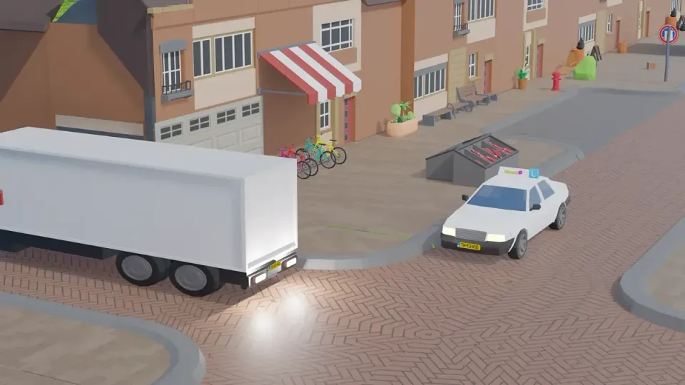 The lorry reverses onto the road. The learner car stops at a distance and waits.