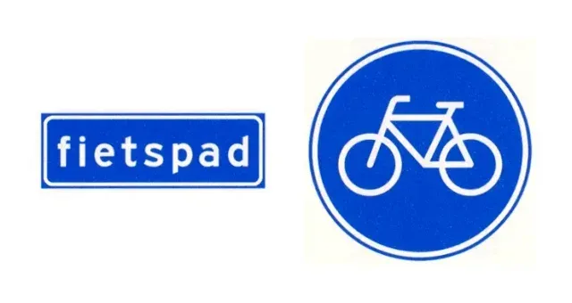 Links het rechthoekige bord met het woord fietspad (G13), rechts het ronde blauwe bord G11.