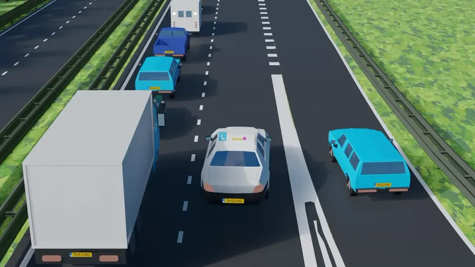 There is traffic on the left. Stay in your lane and ease off the accelerator so a gap opens up.