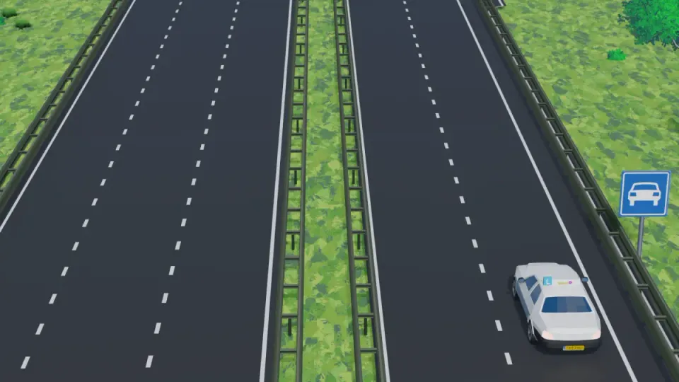 A central reservation separates traffic flows, but the road type and signs determine the speed limit.