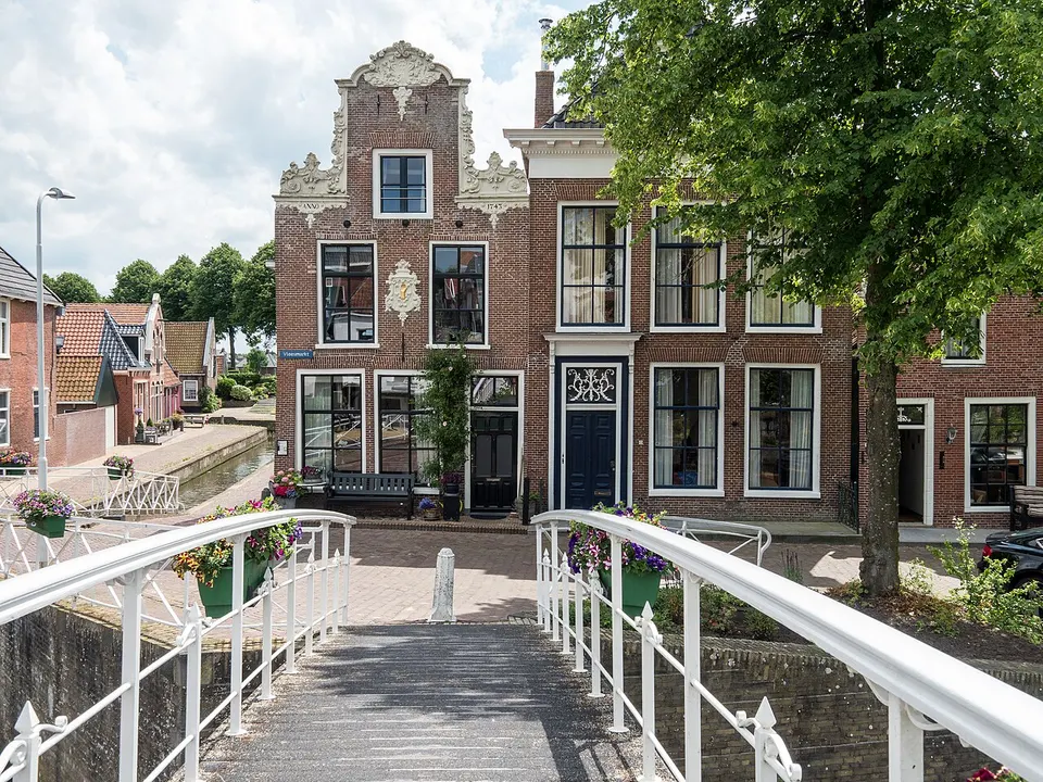 Water with buildings along the banks — area around Dokkum